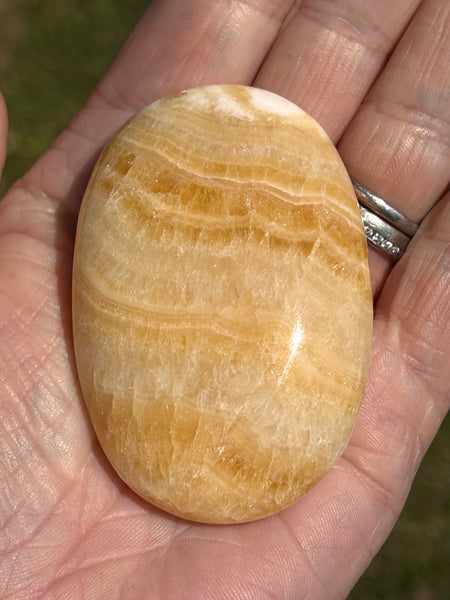 Orange Calcite Palm Stone