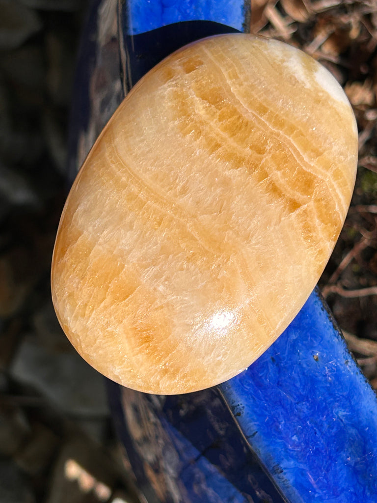 Orange Calcite Palm Stone