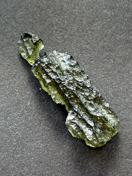 Genuine raw 2.20 grams moldavite from Czech Republic.