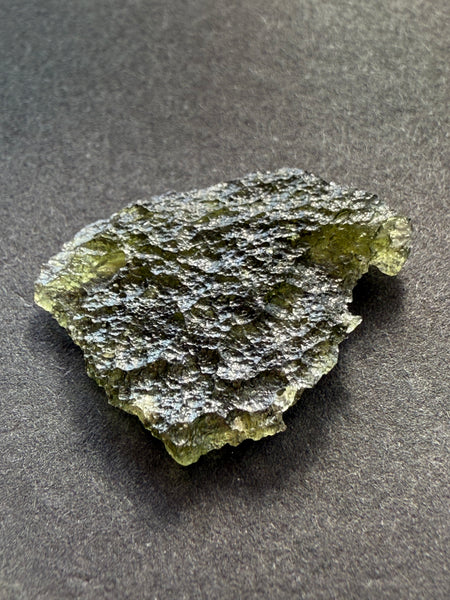 Genuine, raw 2.15 grams Chlum Moldavite from Czech Republic.