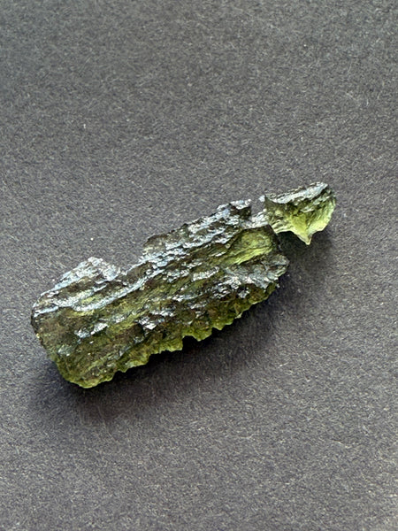 Genuine raw 2.20 grams moldavite from Czech Republic.