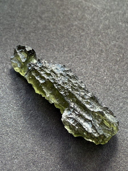Genuine raw 2.20 grams moldavite from Czech Republic.