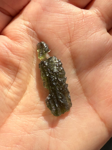 Genuine raw 2.20 grams moldavite from Czech Republic.