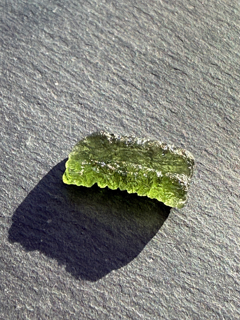 Genuine 1.4 grams Moldavite from Czech Republic.