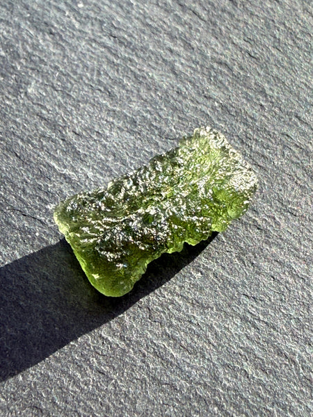 Genuine 1.4 grams Moldavite from Czech Republic.