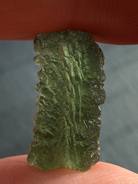Genuine 1.4 grams Moldavite from Czech Republic.