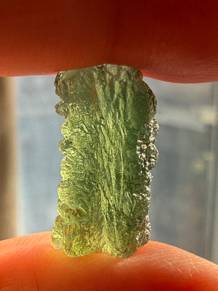 Genuine 1.4 grams Moldavite from Czech Republic.