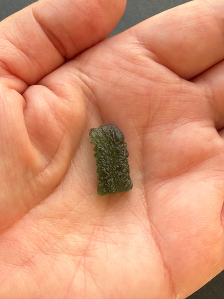Genuine 1.4 grams Moldavite from Czech Republic.